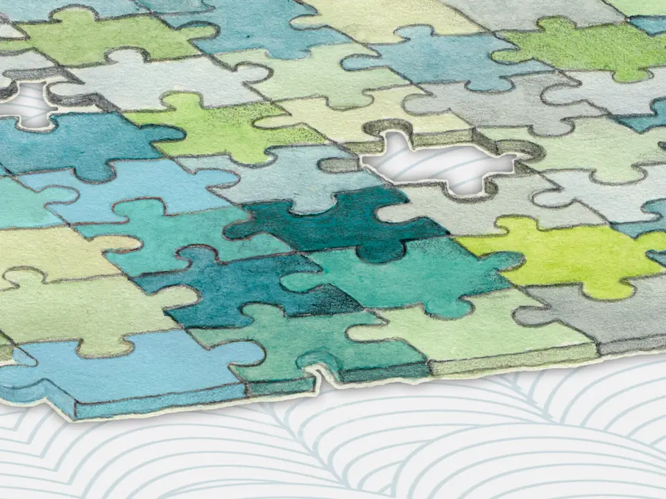 Illustration: Puzzle aus vielen farbigen Teilen